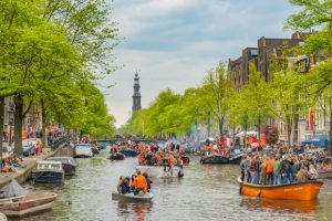 Alt tag not provided for image https://www.airfarewatchdog.com/blog/wp-content/uploads/sites/26/2019/03/Amsterdam-Canal-Kings-Day-Koningsday-Shutter-300x200.jpg